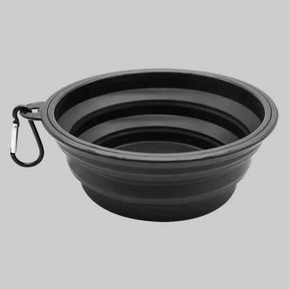 Black collapsible dog bowl with a carabiner