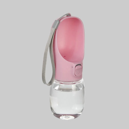 Portable water bottle with a clear container and pink for dogs travel small and big dispenser